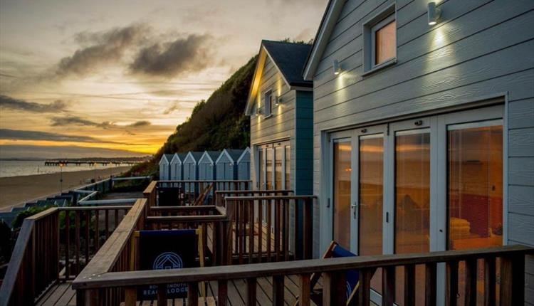 Sunset over the Bournemouth beach lodges in Boscombe 